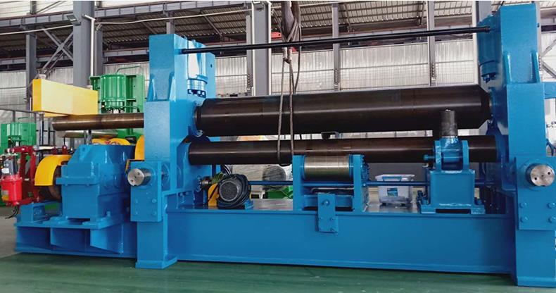 Las características de la máquina dobladora universal CNC de rodillos superiores en producción